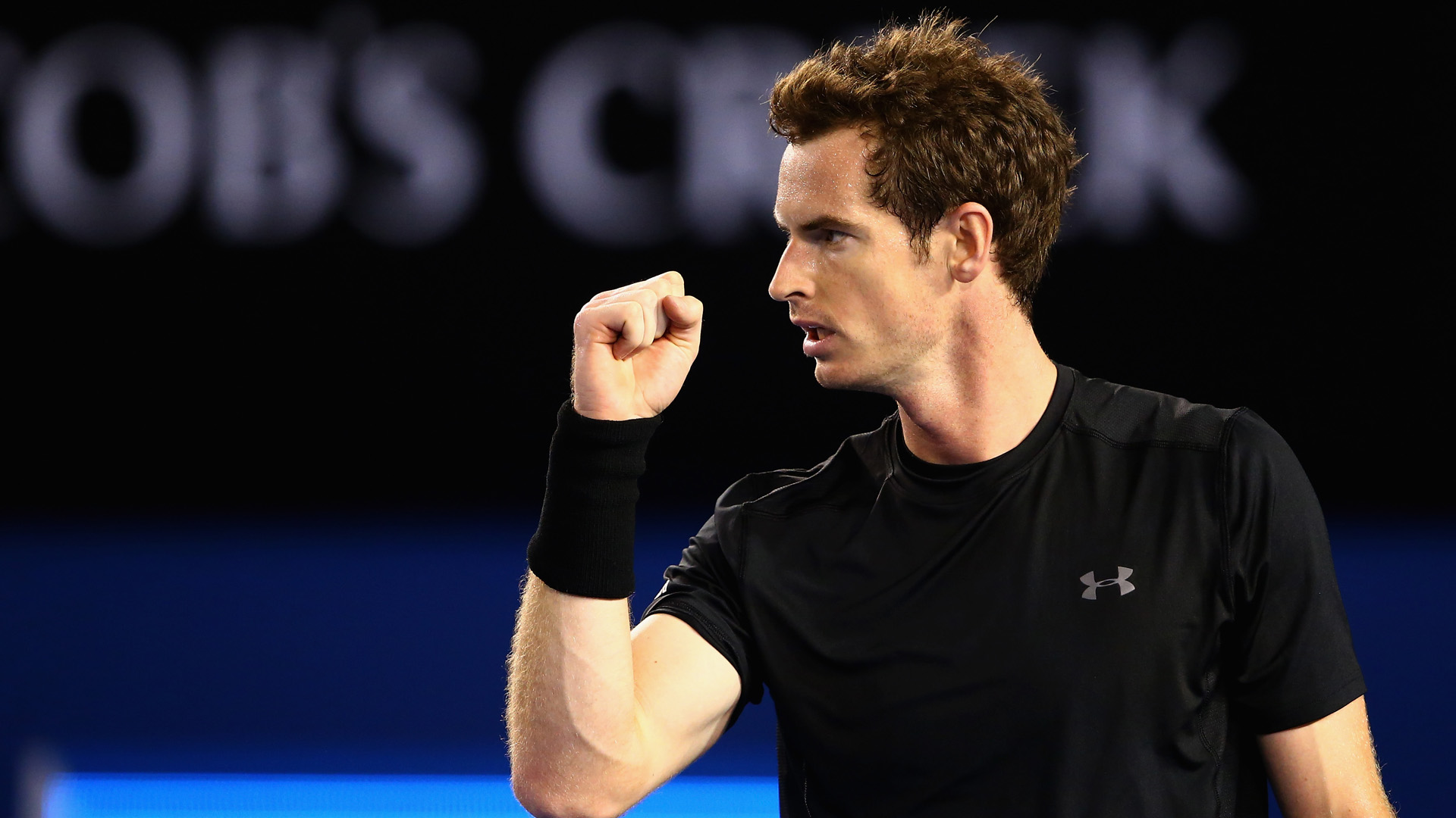 MELBOURNE, AUSTRALIA - JANUARY 25:  Andy Murray of Great Britain celebrates winning the third set in his fourth round match against Grigor Dimitrov of Bulgaria during day seven of the 2015 Australian Open at Melbourne Park on January 25, 2015 in Melbourne, Australia.  (Photo by Clive Brunskill/Getty Images)